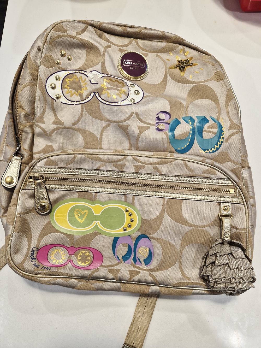 Coach Beige Signature Canvas Backpack with Graphic Accents